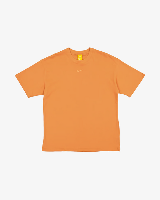 NIKE X NOCTA NRG CS BIG BODY HOT CURRY ORANGE TEE